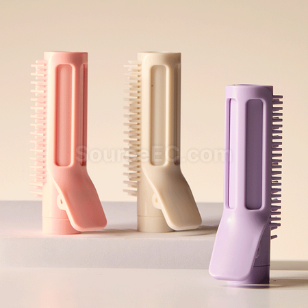 Retractable curling comb