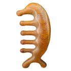 Wooden massage comb