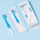 Disposable portable soft-bristle toothbrush with floss